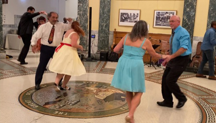 When CSM social dance students Ramin Keyvan and Laura Atherton, center left, got married in fall 2022, they held their reception at the San Mateo County History Museum with its spacious rotunda floor perfect for dancing