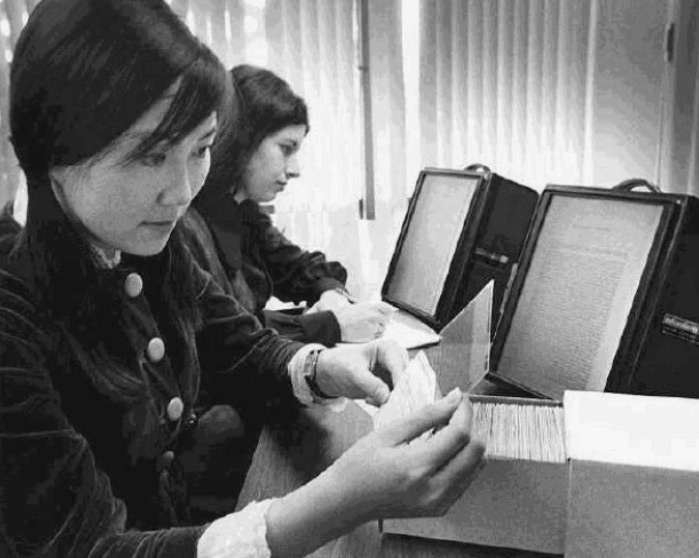 CSM students demonstrate portable microfiche readers in the 1960s