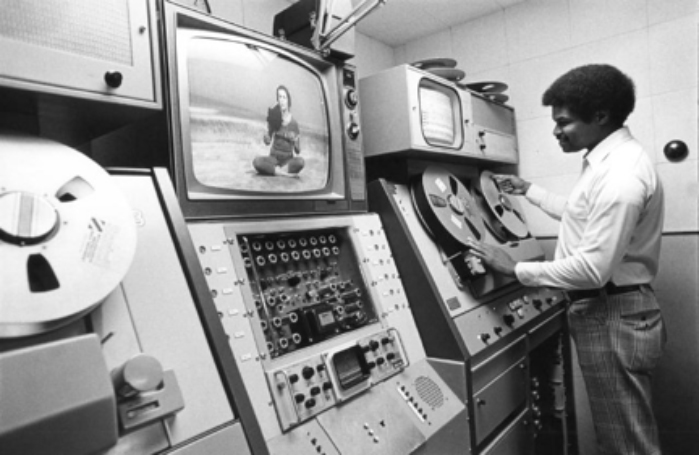 KCSM staffer Clyde Rivers at work in the control room circa 1980