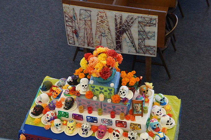 A Makerspace Dia de los Muertos altar memorializes longtime CSM Communications Professor George Kramm, who died in 2015 of injuries sustained in a mountain-biking accident