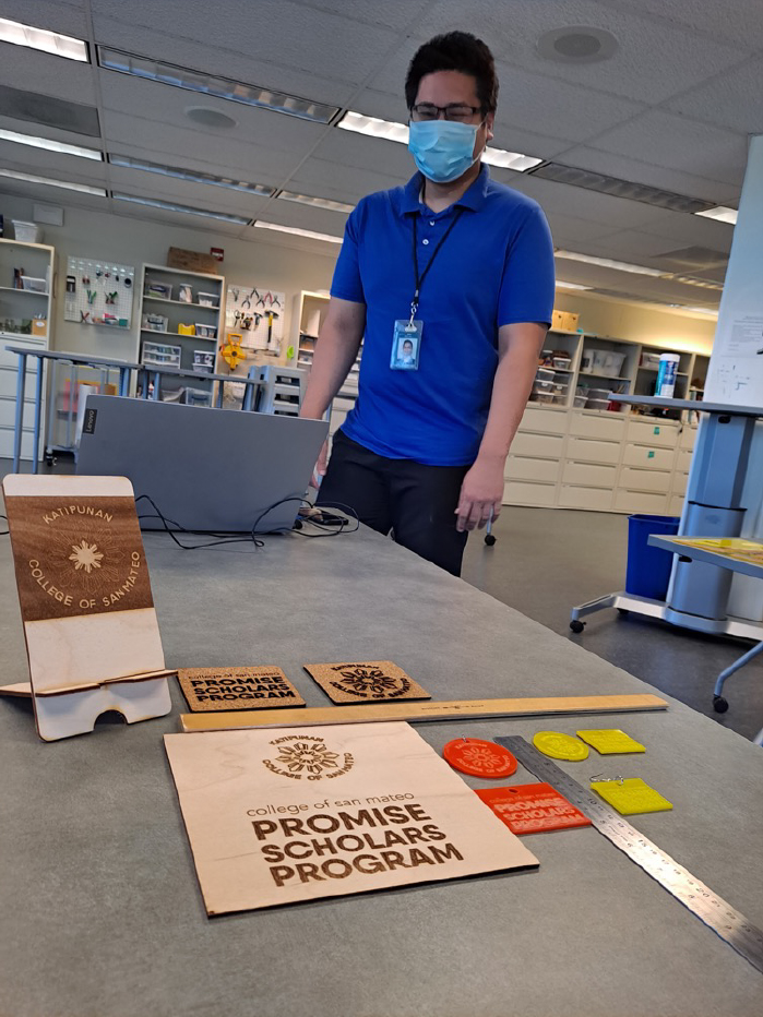 CSM library staffer Jason Yap shows off student Makerspace projects in May 2021