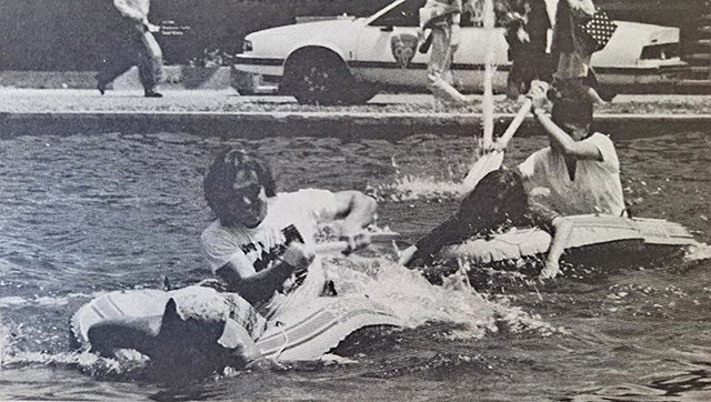 Students race in the fountain outside the library in May 1992 as part of Spring Fever Week