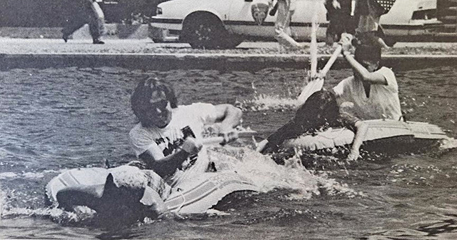 Students race in the fountain outside the library in May 1992 as part of Spring Fever Week